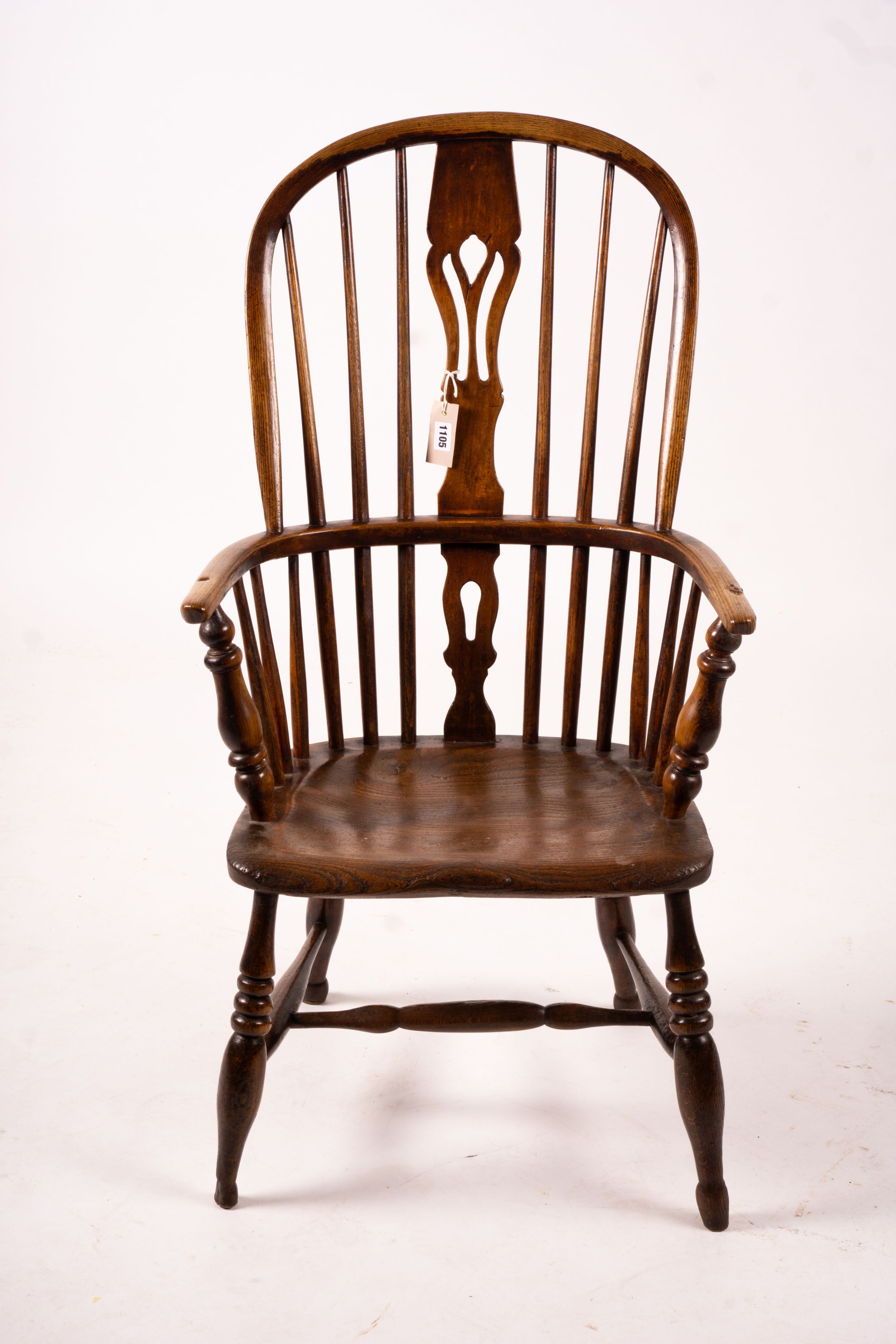 An early 19th century ash, elm and fruitwood Derbyshire area Windsor armchair with 'H' stretcher, width 56cm, depth 44cm, height 106cm